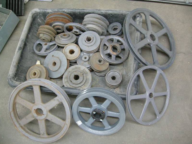 lot 116 image: Group of Cast Pulleys