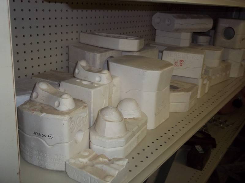 Large lot of ceramic molds includes doll parts, figurines, Christmas Tree