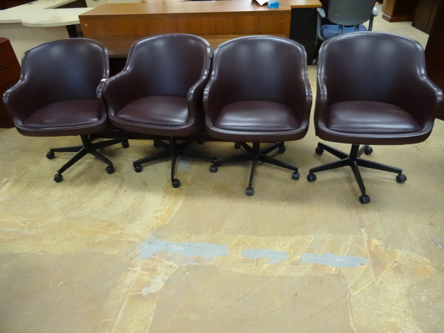 4 Swivel Cushioned Chairs on Wheels