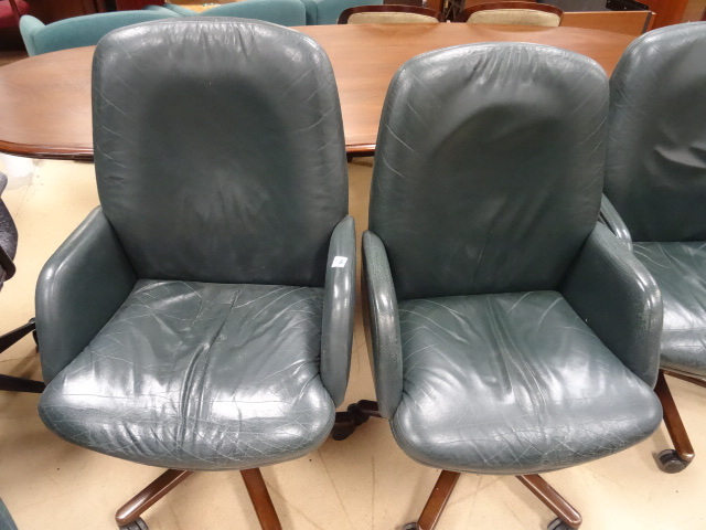 2 Cushioned Office Chairs on Wheels