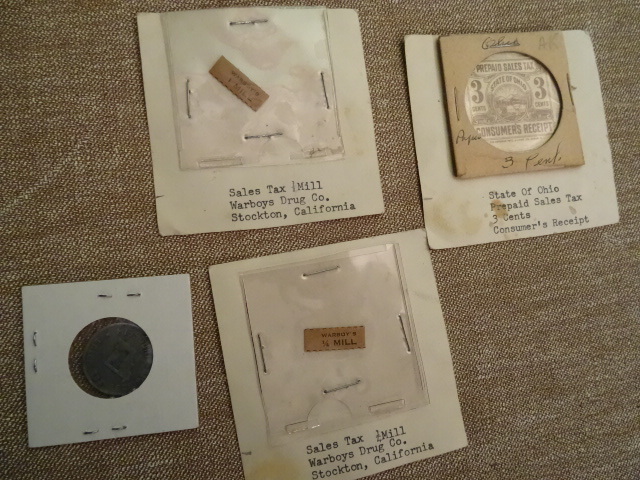 lot 163 image: Misc US Sales Tax Tokens