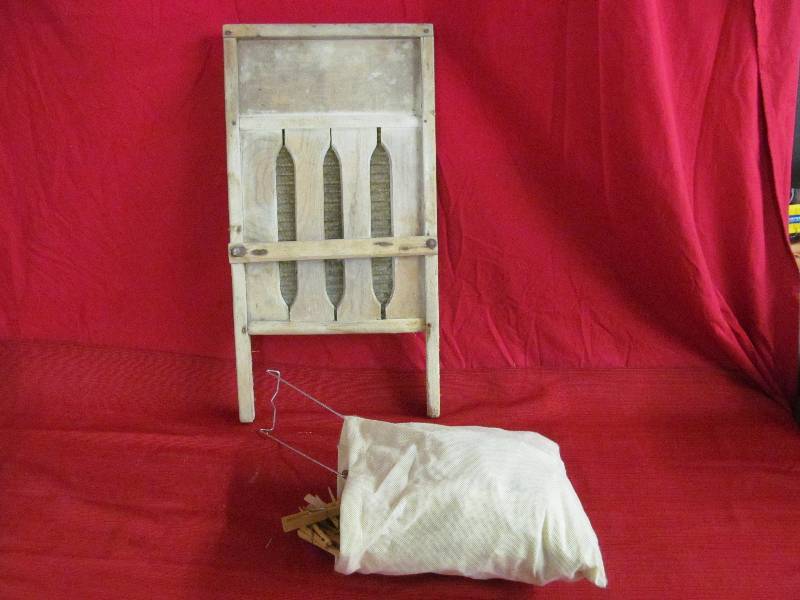 lot 111 image: vintage washboard ,clothespins