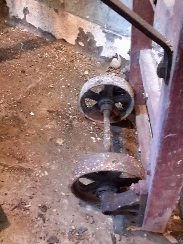 Vintage 2 wheel upright cart.. Came from a Feed mill..Steel Wheels