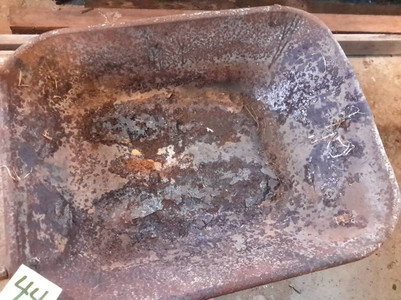 Very old VERY RUSTY wheel Barrow.