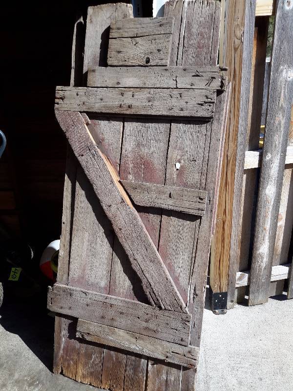 Barn Door with very wethered barn wood.  Approx 36in x 65in h.