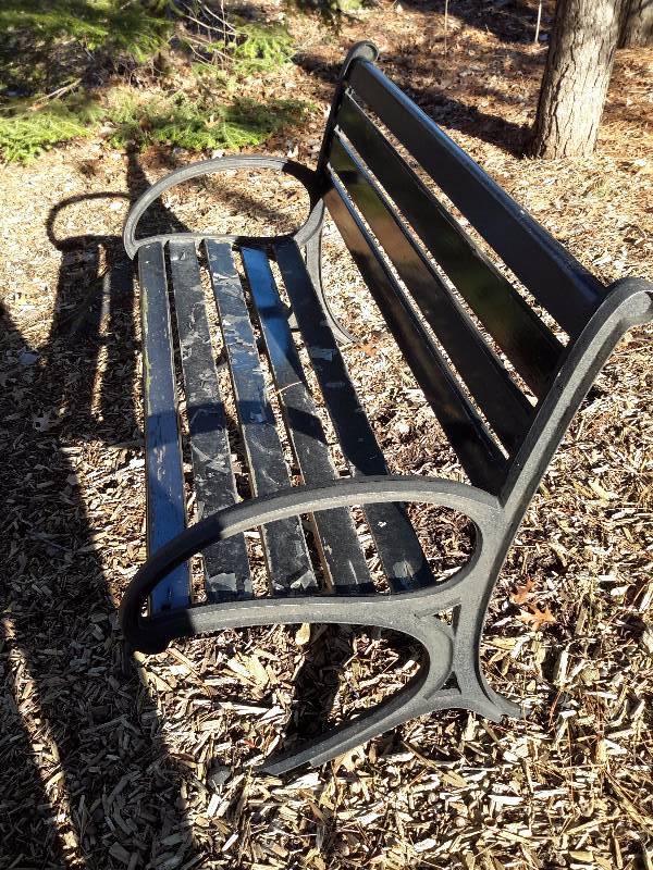 Metal and wood park bench