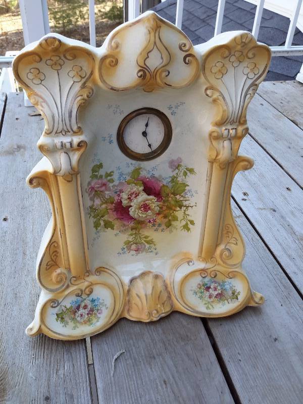 Porcelain Mantel Clock.. Wind up..