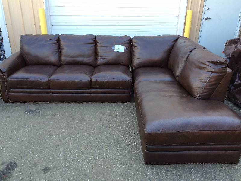 lot 1 image: Marks & Cohen Savoy 2 piece Leather Sectional a classic L-shaped couch