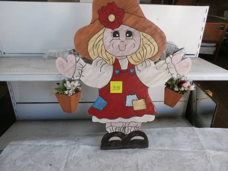 wood lawn art.