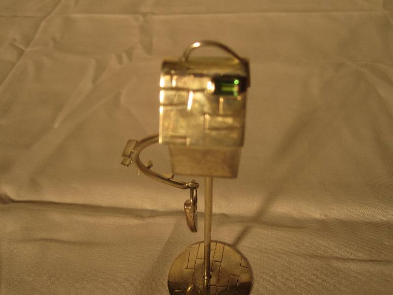 lot 2 image: Sterling silver bird house by artist Kim Crocker