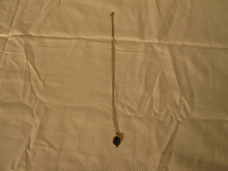 lot 4 image: Vintage gold plate 120 24 karat necklace with green gemstone pendant