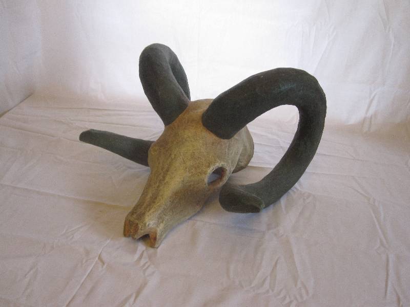 lot 23 image: Cool hand painted paper mache ram scull