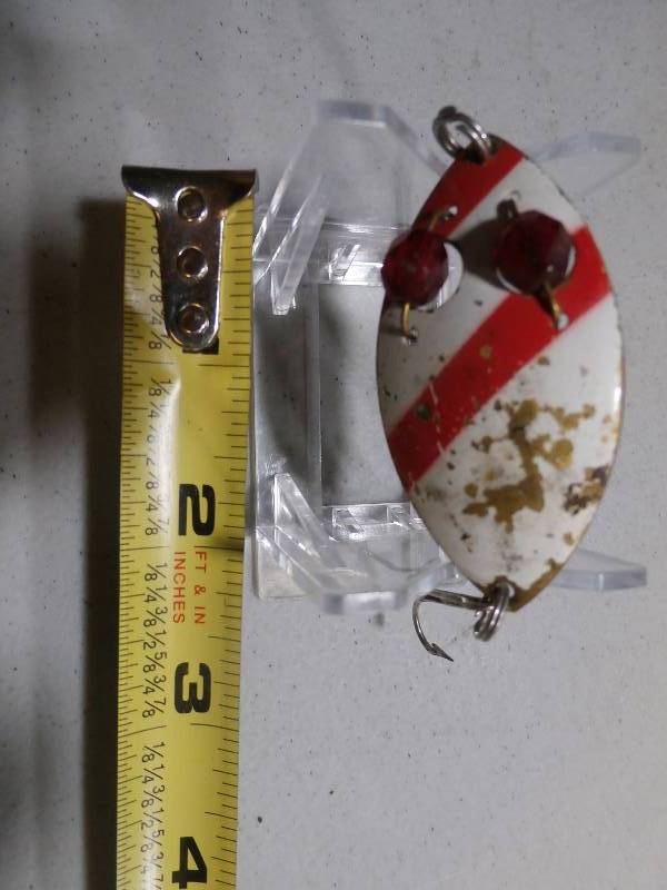 lot 14 image: red eyed spoon