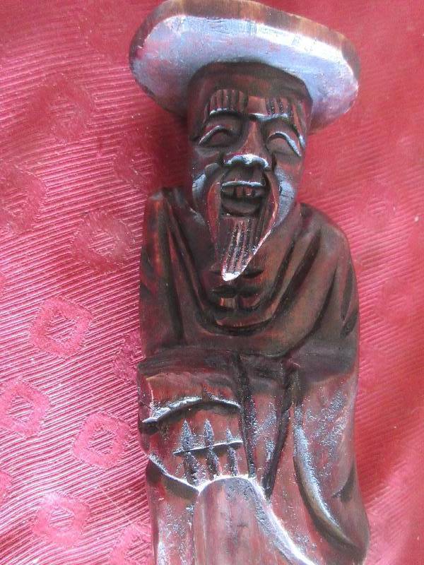 HAND CARVED WOODEN STATUE