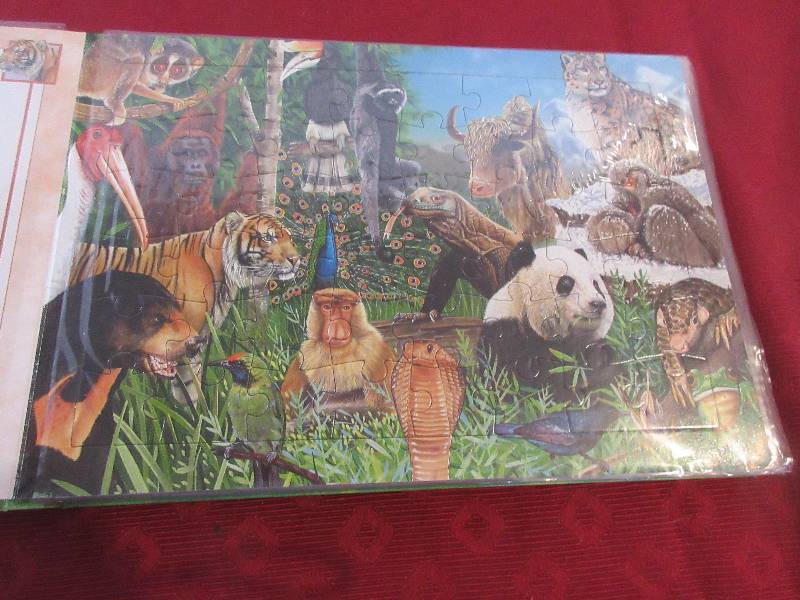 ANIMALS OF THE WORLD PUZZELS BOOK