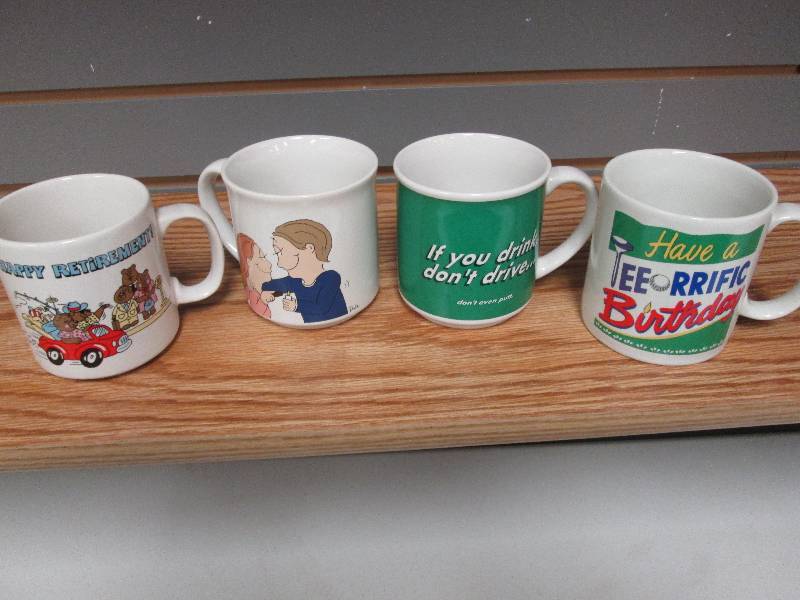 Lot of 4 assorted ceramic mugs...