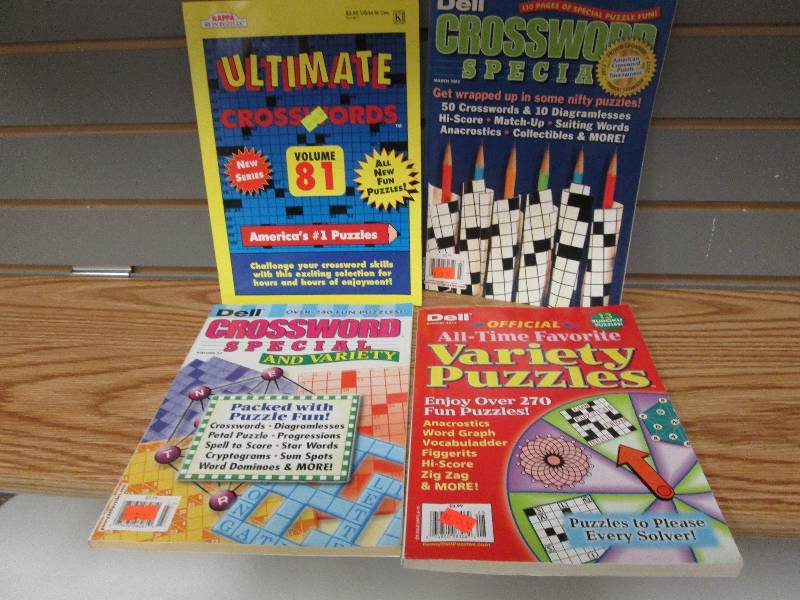 Lot of 4 crossword & puzzle books...