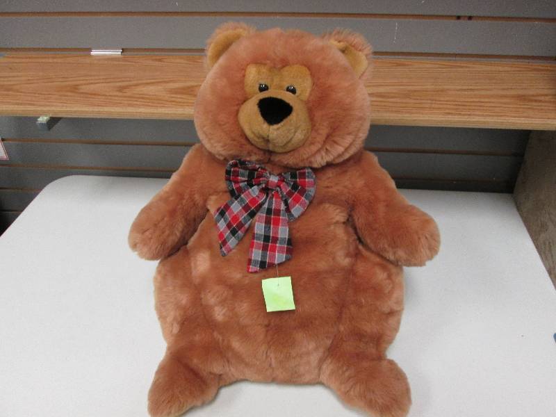 Large plush brown teddy bear...