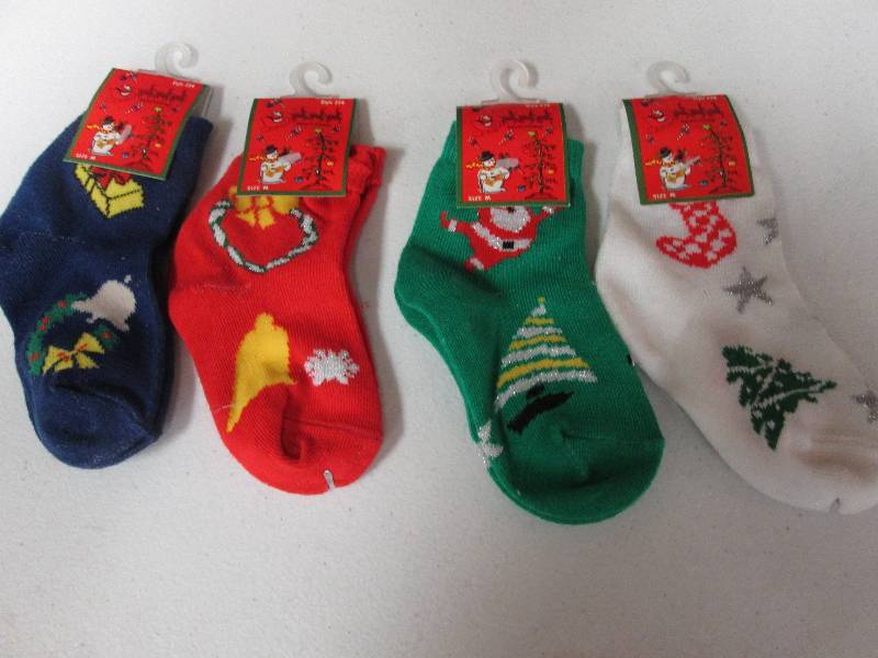 Lot of 4 medium Christmas socks...