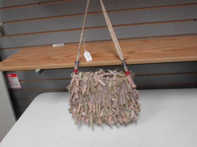 Fabric tan fringed purse...