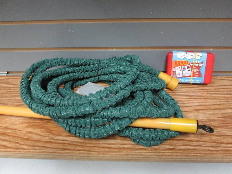 Small sewing kit, collapsible hose...