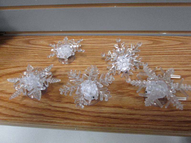 Set of 5 color changing snowflakes ...