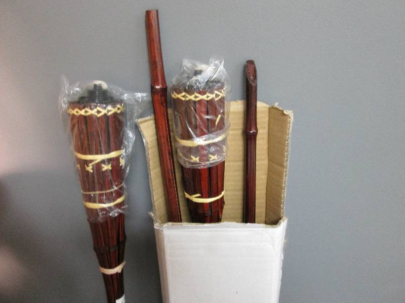 Set of 4 Tiki torches ...