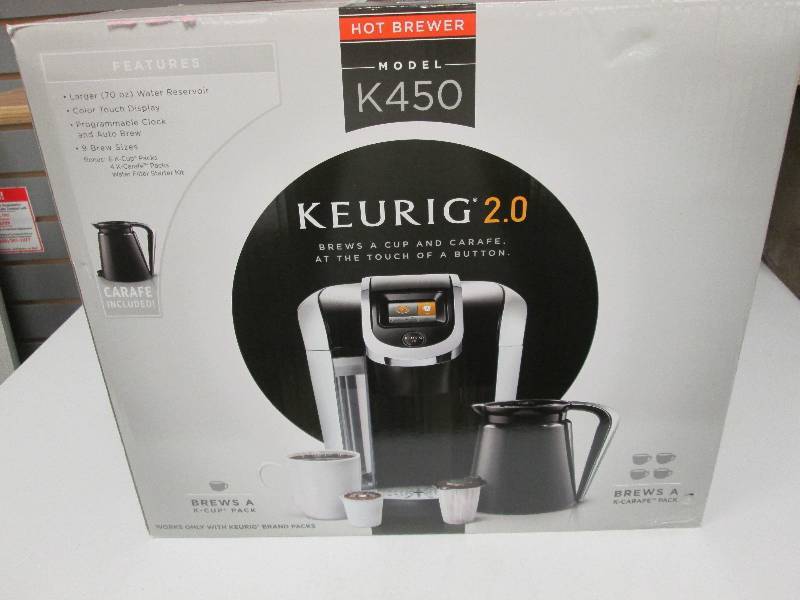 Keurig K-450  brews a cup & carafe ...