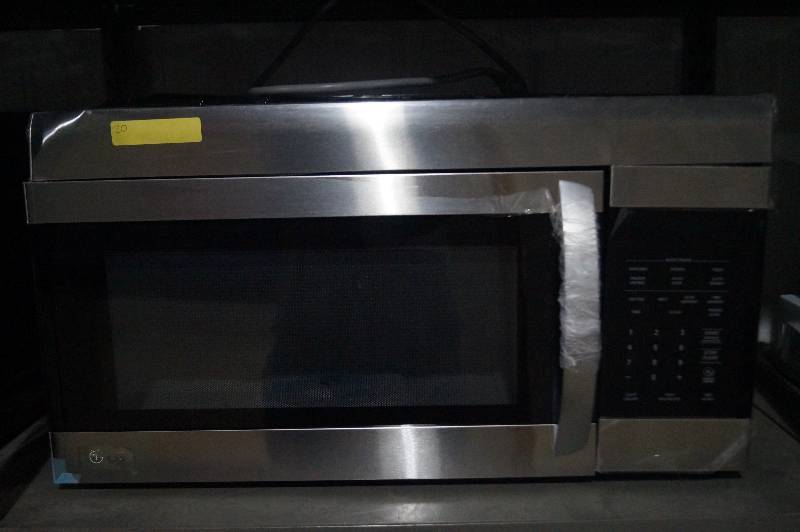 lot 20 image: Over the Range Microwave Oven in Stainless Steel