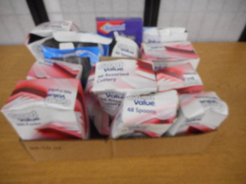 MASSIVE LOT OF PLASTIC FORKS, SPOONS, AND KNIVES.