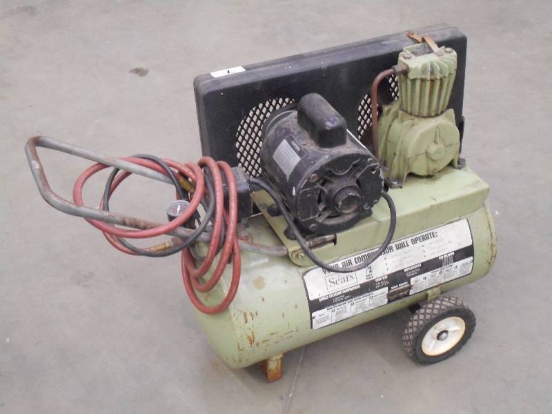 lot 7 image: Sears 12HP 7.5-Gallon Electric Air...