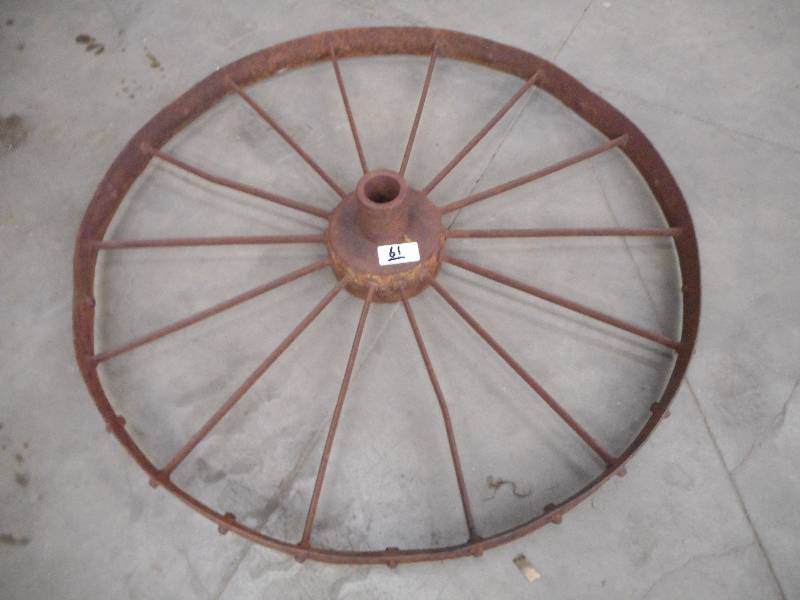 lot 61 image: (1) Antique 36 Steel Wheel ...