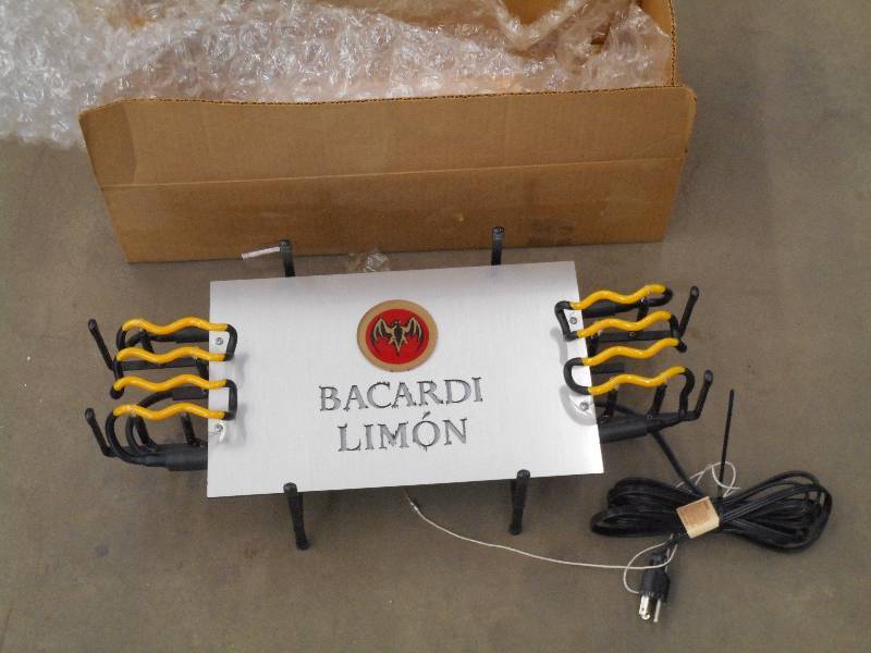 lot 74 image: Bacardi Limon Neon, Like New, 22...