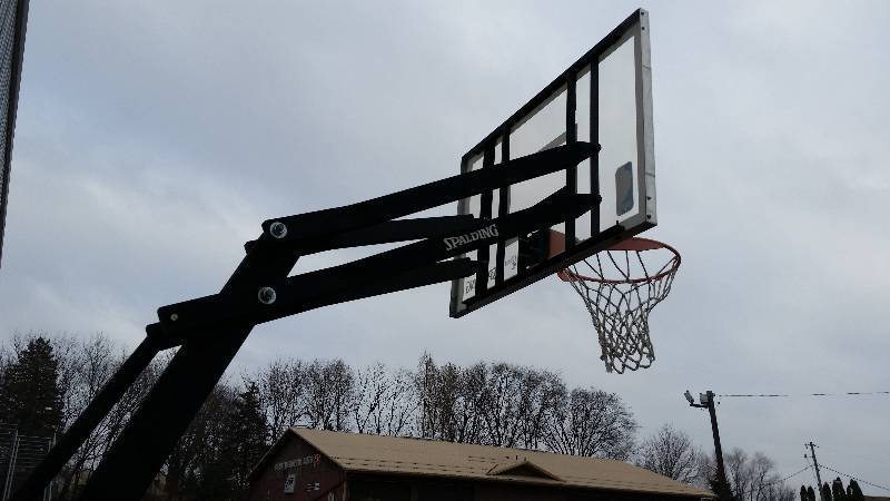lot 13 image: Spaulding The Beast Adjustable Professional Basketball Hoop Set