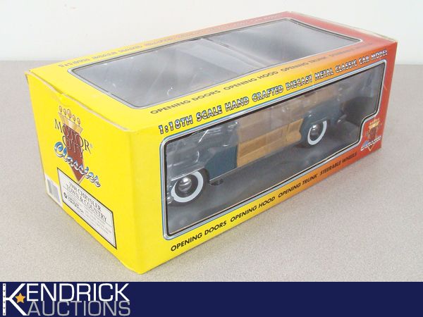 lot 47 image: MIB Motor City Classics 118 Scale 1948 Chrysler Town & Country