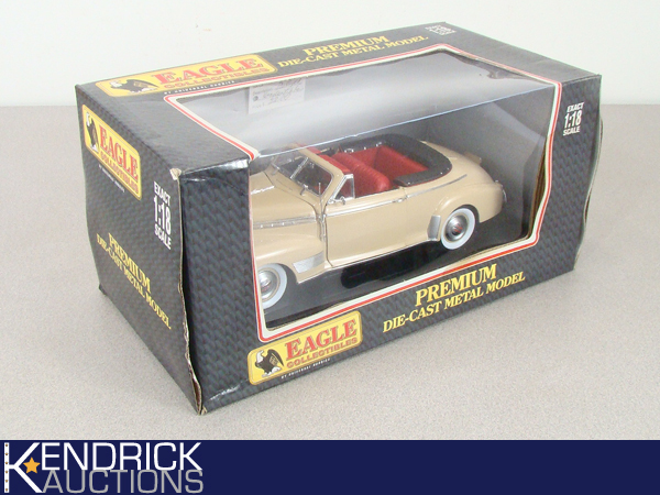 lot 48 image: MIB Eagle Collectibles 118 Scale 1941 Chevrolet Deluxe Convertible