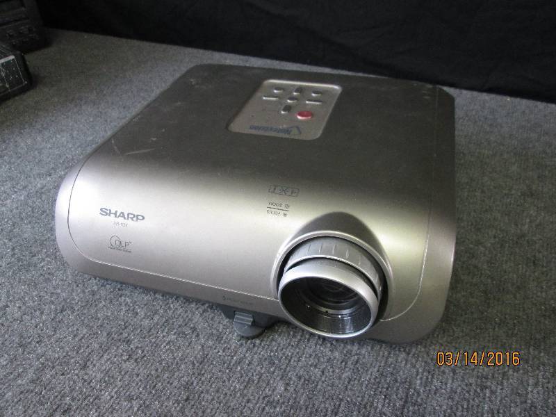 lot 36 image: Sharp XR-10X projector, does not po...