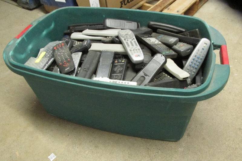 lot 71 image: Box filled with various remote cont...