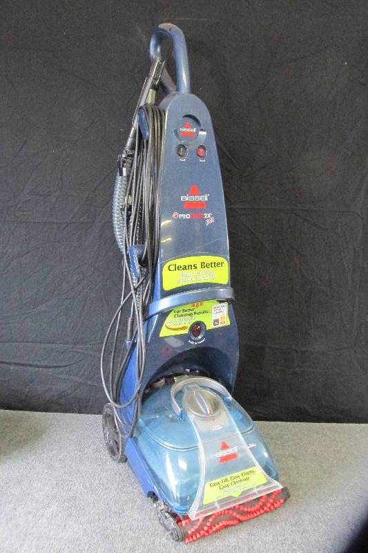 lot 73 image: Bissell Pro Heat Pet carpet shampoo...