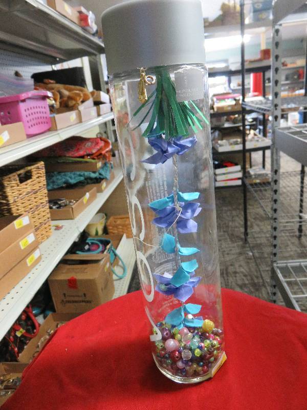 Glass jar with beads