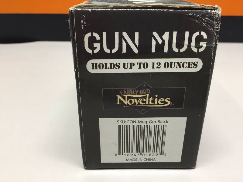 lot 21 image: GUN MUG