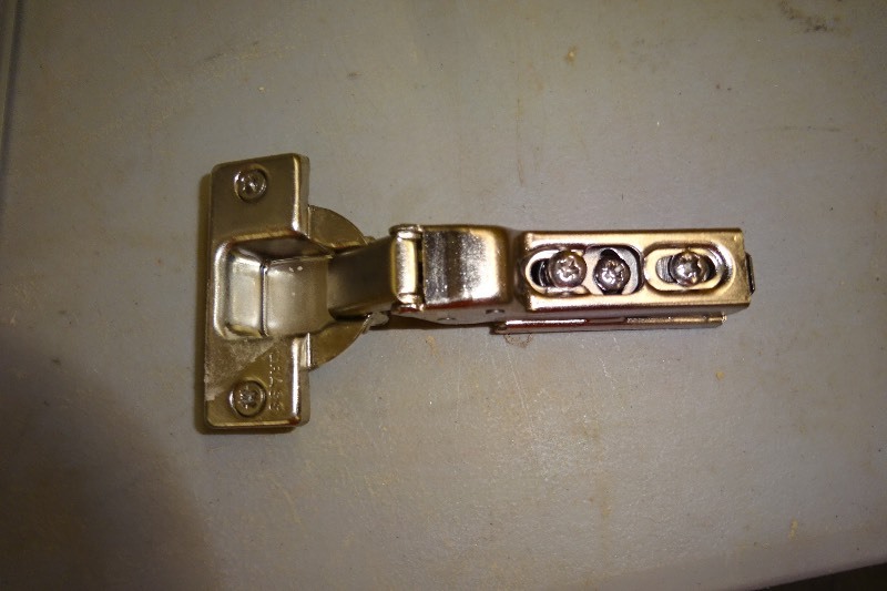 lot 55 image: Bin of cabinet hinges
