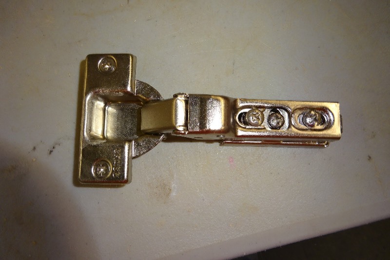 lot 56 image: Bin of cabinet hinges