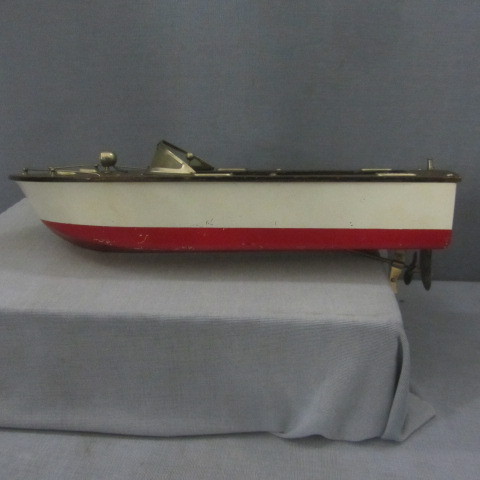lot 83 image: Vintage Sea Wolf Tin Motor Boat