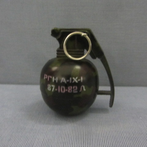lot 135 image: Hand Grenade Cigarette Lighter
