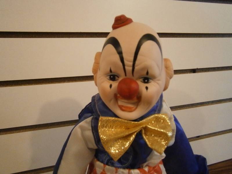 Porcelain Clown FigurineDoll wstand