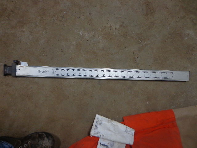lot 15 image: Orange Bag & 10ft. Telescoping Aluminum Rod
