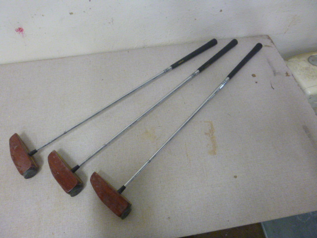 lot 28 image: 2 Odd Putters