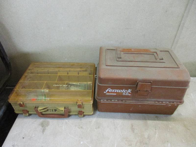 2 tackle boxes and tackle