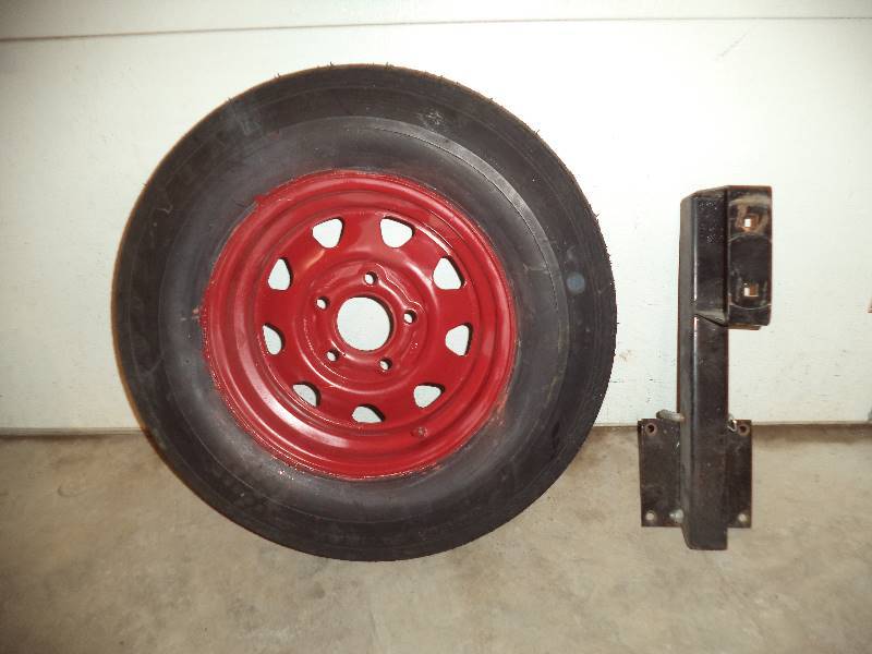 lot 9 image: Good Year TireRim & Tire Carrier